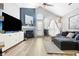 Inviting living room with a fireplace, vaulted ceiling, lots of natural light, and modern decor at 7779 Harbour # 51, Indianapolis, IN 46240