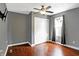 Empty bedroom featuring a large closet, hardwood floors, and a window at 790 N 14Th St, Noblesville, IN 46060