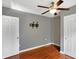 Bedroom with hardwood floors, ceiling fan, closet and window at 790 N 14Th St, Noblesville, IN 46060