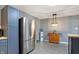 This updated kitchen offers stainless steel appliances, stylish cabinets, and modern decor at 790 N 14Th St, Noblesville, IN 46060