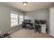 Home office with dual workstations with two large windows at 8394 S Shady Trail Dr, Pendleton, IN 46064