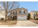 Charming two-story home featuring a two-car garage, well-maintained lawn, and classic architectural details at 8394 S Shady Trail Dr, Pendleton, IN 46064