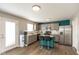 Stylish kitchen featuring stainless steel appliances, an island with bar stools, and ample counter space at 8394 S Shady Trail Dr, Pendleton, IN 46064