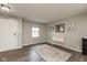 Inviting living room with a large window, neutral paint, and modern flooring, perfect for relaxation and gatherings at 8394 S Shady Trail Dr, Pendleton, IN 46064