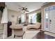 Comfortable seating area bathed in natural light through large windows, creating a bright and inviting space at 8416 Whitaker Valley Blvd, Indianapolis, IN 46237