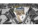 Aerial view of the house with a view of the rooftop and surrounding neighborhood at 8717 Vintner Ct, Indianapolis, IN 46256
