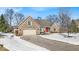 Charming brick home with a two-car garage and a well-manicured lawn in a desirable neighborhood at 8717 Vintner Ct, Indianapolis, IN 46256