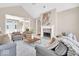 Spacious living room featuring a fireplace, neutral decor, and comfortable seating arrangement at 8717 Vintner Ct, Indianapolis, IN 46256