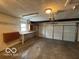 Spacious two car garage with built-in storage, work bench, and lots of room for vehicles or hobbies at 8738 Montery Ct, Indianapolis, IN 46226