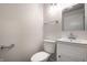 Cozy half-bath with classic vanity and lighting at 8888 Cholla Rd, Indianapolis, IN 46240
