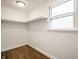 Walk-in closet featuring a window and shelving for optimal storage and organization at 8888 Cholla Rd, Indianapolis, IN 46240