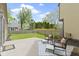 Private backyard with patio seating and well-maintained landscaping at 9788 Pine Ridge North Dr, Fishers, IN 46038