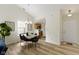 Open concept dining area showcasing stylish chairs and seamless flow into the kitchen at 9788 Pine Ridge North Dr, Fishers, IN 46038
