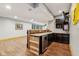 Finished basement bar with rustic wood accents, granite countertop, and modern appliances at 9956 Hickory Ridge Dr, Zionsville, IN 46077
