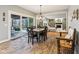 Eat-in kitchen features brick flooring, an eating area and access to the outdoors at 9956 Hickory Ridge Dr, Zionsville, IN 46077