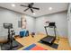Home gym with modern exercise equipment, laminate floors, and recessed lighting at 9956 Hickory Ridge Dr, Zionsville, IN 46077