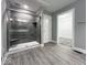 Bathroom features a glass-enclosed shower with tiled walls and a walk-in closet at 103 N Brenrich Rd, Pendleton, IN 46064