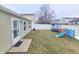 Fenced backyard featuring a well-maintained lawn, play set, and convenient access from the home at 10921 Walnut Grv, Camby, IN 46113