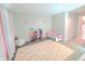 Charming bedroom with soft colors, playful decor, and ample space for play at 10921 Walnut Grv, Camby, IN 46113