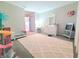 Charming bedroom with soft colors, playful decor, and ample space for play at 10921 Walnut Grv, Camby, IN 46113