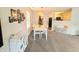 Inviting dining area with natural light, perfect for Gathering meals and gatherings, blending seamlessly with the living spaces at 10921 Walnut Grv, Camby, IN 46113