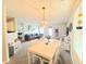 Cozy living space with a view of the dining area, featuring a comfortable couch and stylish decor for relaxed living at 10921 Walnut Grv, Camby, IN 46113