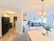 Modern open concept layout with a smooth transition between the kitchen, dining area, and living spaces, perfect for entertaining at 10921 Walnut Grv, Camby, IN 46113