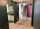 Hallway offering convenient access to the kitchen, stairs, and other parts of the home, offering seamless flow at 1148 Nanwich Ct, Indianapolis, IN 46217