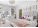 Bright and airy bedroom with a window seat, built-in bookcase, and neutral decor at 11620 Willow Springs Dr, Zionsville, IN 46077