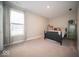 Bedroom with carpet flooring, neutral walls, and a large window for natural light at 1225 Stonehaven Dr, Westfield, IN 46074