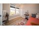 Cozy bedroom featuring ample natural light, neutral walls, and a stylish rug adding warmth and character at 1225 Stonehaven Dr, Westfield, IN 46074