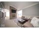 Comfortable covered patio with fireplace, TV, stylish outdoor seating, and elegant decor at 1225 Stonehaven Dr, Westfield, IN 46074