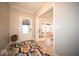 Bright foyer featuring stylish flooring, a decorative rug, and glass french doors leading to another room at 1225 Stonehaven Dr, Westfield, IN 46074