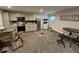 Finished basement with kitchenette area, stainless steel appliances, and ample counter space at 12889 Girvan Way, Fishers, IN 46037