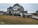 Charming two-story home with brick and siding exterior, attached two car garage, and manicured lawn at 12889 Girvan Way, Fishers, IN 46037