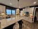 Beautiful kitchen featuring granite countertops, stainless steel appliances, and hardwood floors at 12889 Girvan Way, Fishers, IN 46037