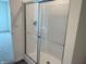 Modern glass enclosed shower stall offering a clean and contemporary look at 1414 Bluebonnet Pl, Shelbyville, IN 46176