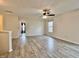 Upstairs bonus room featuring durable floors, neutral walls, and natural light from a window at 1427 Broyles Ln, Indianapolis, IN 46231