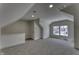 Neutral carpeted bonus room with natural light and a partial railing at 16822 Imperial Ct, Fishers, IN 46040