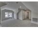 Spacious bonus room with a window overlooking neighborhood and neutral carpeting at 16822 Imperial Ct, Fishers, IN 46040