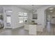 Charming dining area with a round glass table, chandelier, and views of the backyard at 16822 Imperial Ct, Fishers, IN 46040