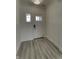 Entryway featuring a solid door and wood-style vinyl flooring at 16822 Imperial Ct, Fishers, IN 46040