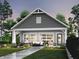 Relaxing outdoor space featuring ample seating, lush landscaping, and a covered patio at 16822 Imperial Ct, Fishers, IN 46040