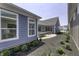 Charming exterior featuring a manicured garden patio, perfect for outdoor gatherings at 16822 Imperial Ct, Fishers, IN 46040