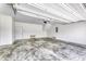 An empty garage with an overhead door, ready for parking and storage at 16822 Imperial Ct, Fishers, IN 46040