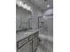 Bathroom with granite countertops, tile floors, a glass enclosed shower, a toilet and a mirror at 16822 Imperial Ct, Fishers, IN 46040