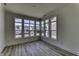 Bright living area with modern vinyl floors, abundant windows, and ample natural light at 16822 Imperial Ct, Fishers, IN 46040