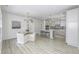 Open concept kitchen with an eat in island and an adjacent dining area at 16822 Imperial Ct, Fishers, IN 46040