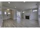 Bright living room featuring neutral walls, fireplace and stylish flooring at 16822 Imperial Ct, Fishers, IN 46040