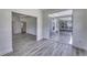 Living room with hardwood floors and a sliding glass door leading to a back patio at 16822 Imperial Ct, Fishers, IN 46040
